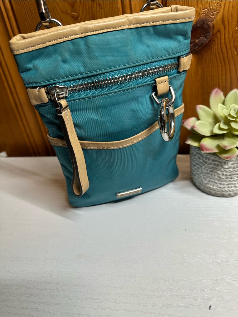 Tumi Teal and Beige Crossbody Bag with Silver Plate
